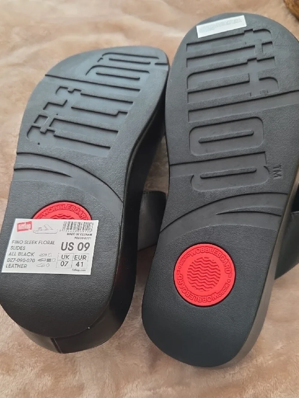 Fitflop Black Slide Sandals with Floral Accent
